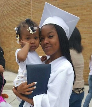 Acacia receives her degree